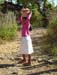 Girl carrying ground maize
